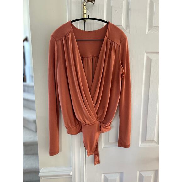 Free People Revolve Turnt Body Suit Orange Brown Draped Plunge Neck Long Sleeve - Picture 2 of 6
